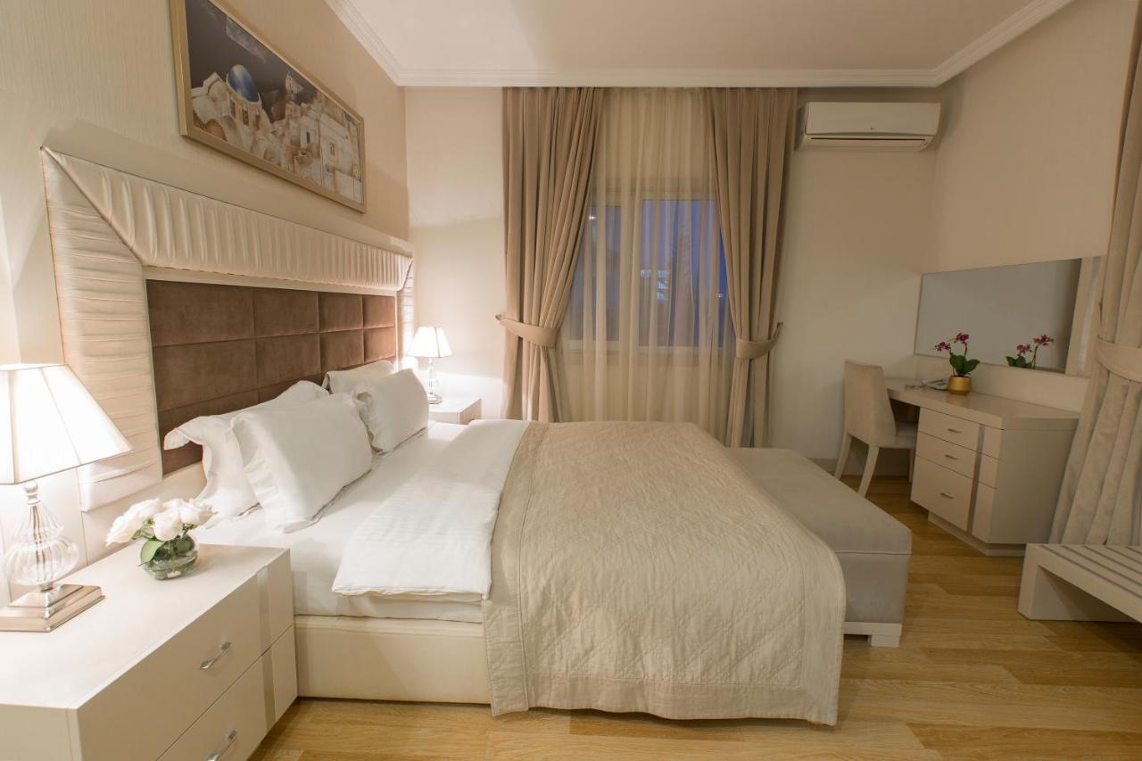 Gabala Garden Hotel Extérieur photo A bedroom in a hotel